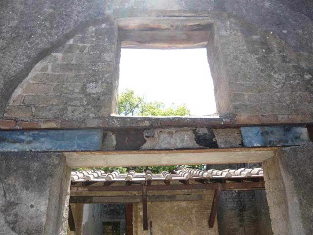 VI.8, Herculaneum. August 2013. Looking east to window above entrance doorway, and remains of carbonised wood. Photo courtesy of Buzz Ferebee.